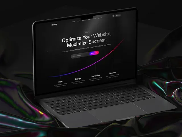 A laptop on a dark desk showing a search optimisation landing page headlined Optimize Your Website.